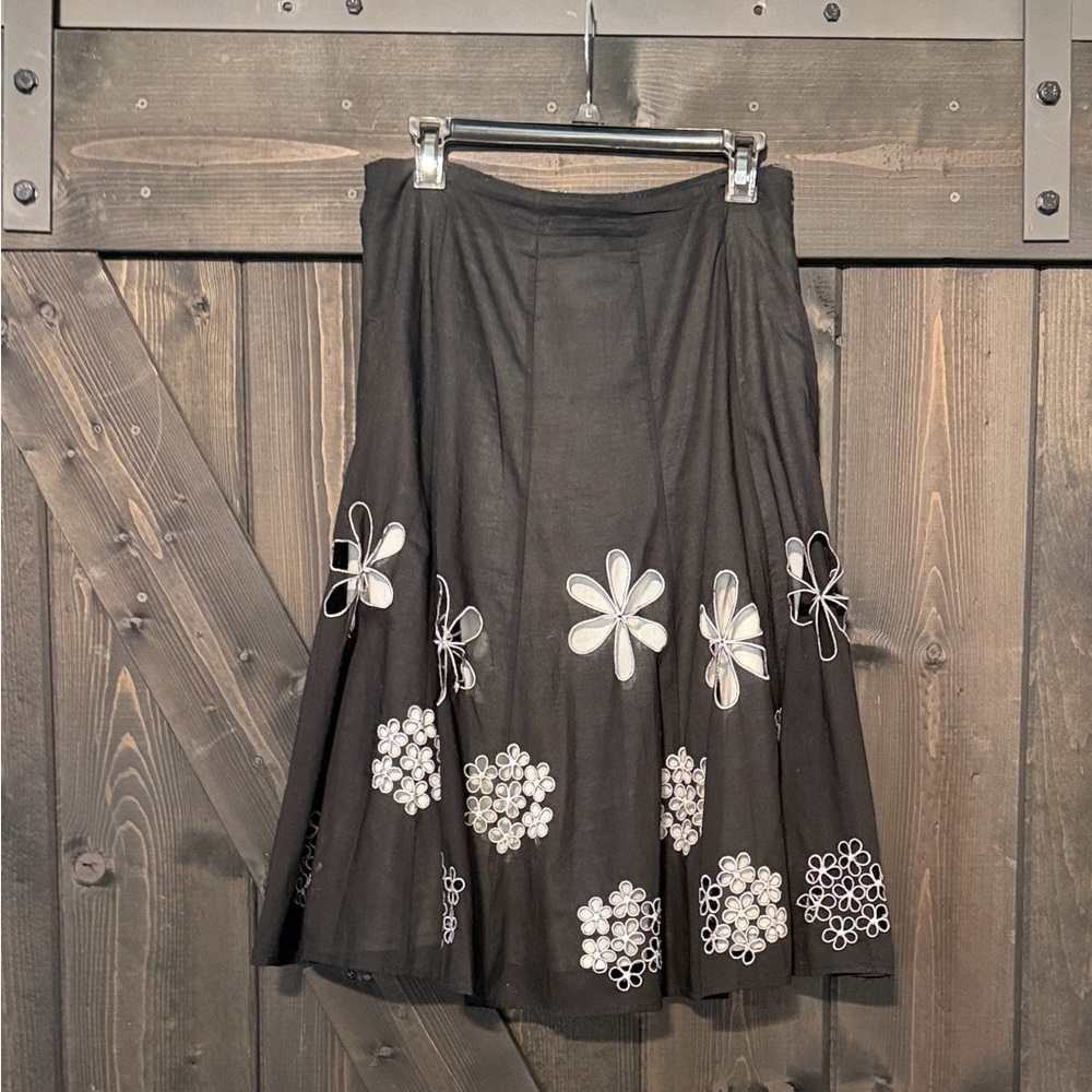 Sunny Leigh Black Skirt with White Floral Cutout Design
